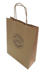 un-sac-en-papier-kraft-brun-naturel-à-poignées-torsadées-personnalisé-pour-l'épicerie-fine-la-fruitière-à-Morteau-et-Besançon